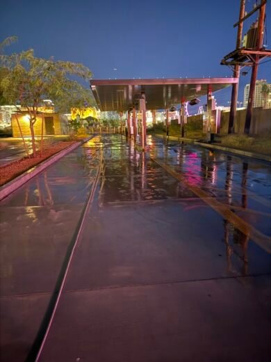 Cleaned commercial walkway at dusk with the Las Vegas skyline in the distance