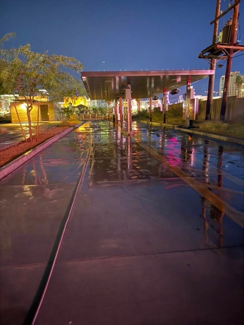 Cleaned commercial walkway at dusk with the Las Vegas skyline in the distance