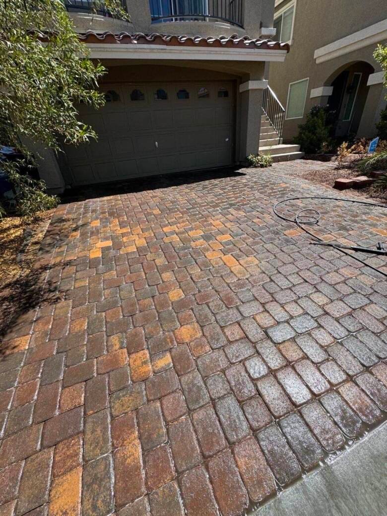 Interlocking paver driveway in front of a Las Vegas home after cleaning