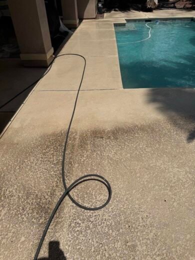 Pool Deck Cleaning Las Vegas Textured pool deck beside a backyard swimming pool in Las Vegas