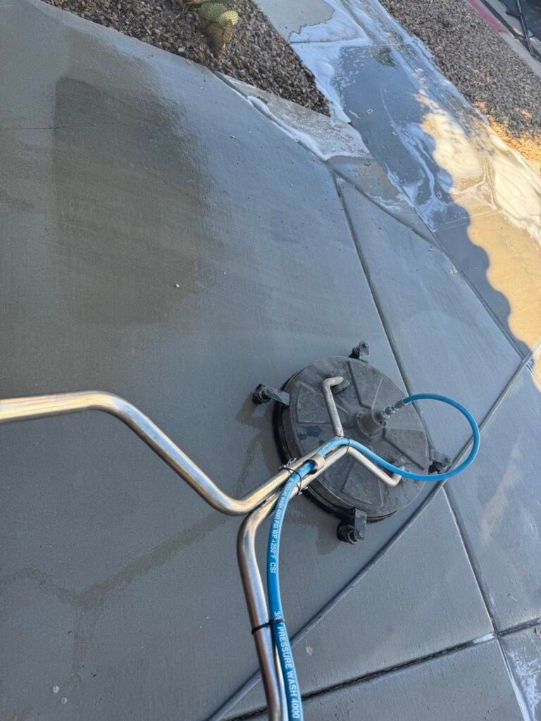 Rotary surface cleaner on residential concrete with a clear clean line