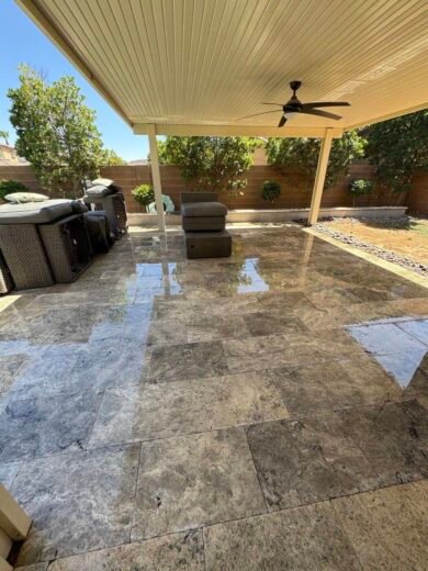 Travertine Patio Cleaning Las Vegas Clean travertine patio under a covered patio cover in a Las Vegas backyard